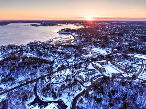 aerial winter shot of campus and ocean