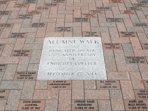 image of bricks and inscription on alumni walk