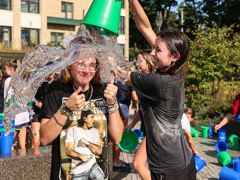 People dumping ice water over themselves